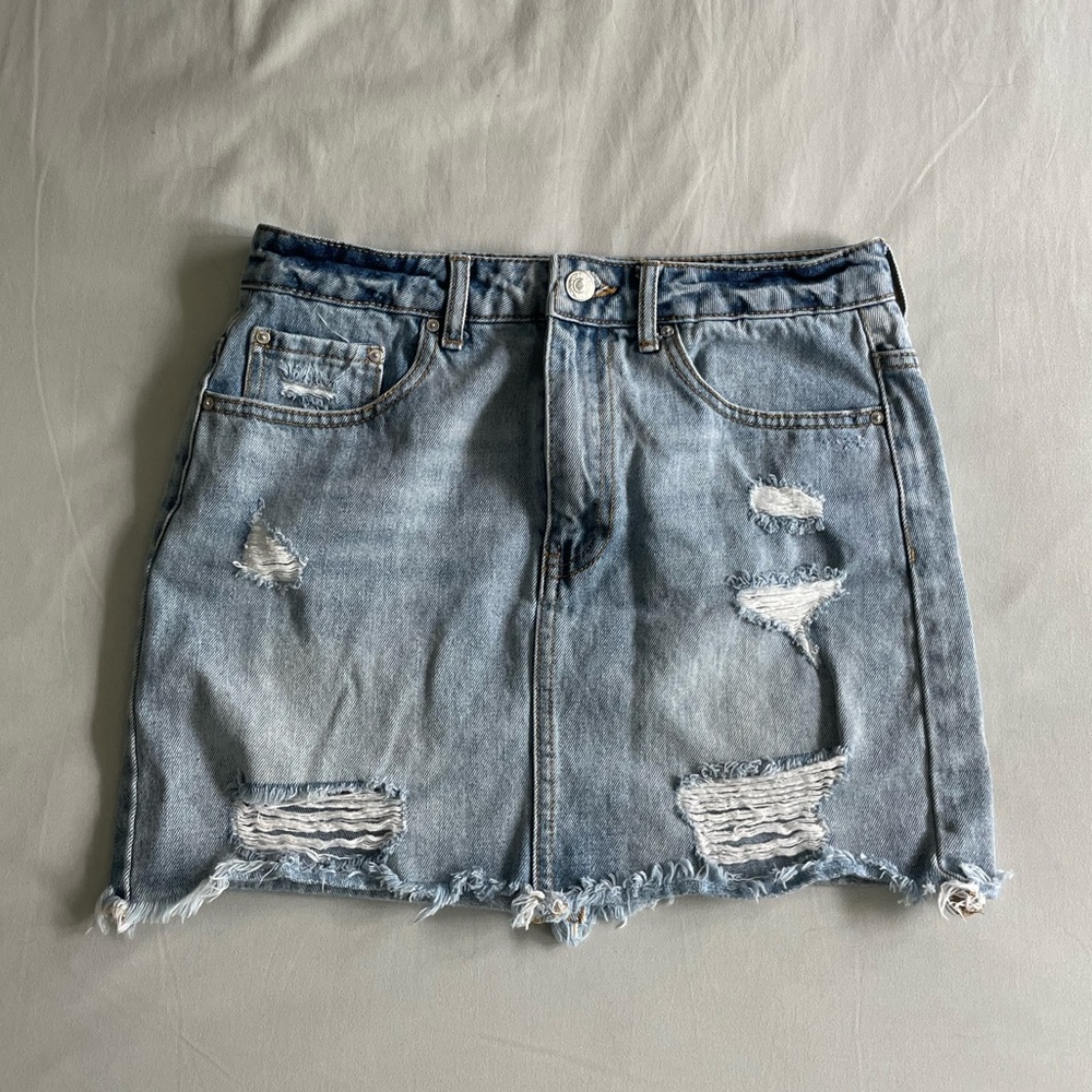 Distressed denim skirt